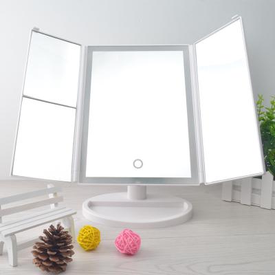 China Touchscreen LED Trifold Vanity Mirror 10x Lighted Folding Travel Mirror for sale