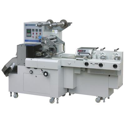 China Multifunctional food candy pillow candy wrapper packing machine, Dxd-800q candy packing machine for sale