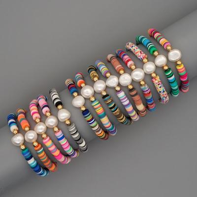 China 2021 BOHEMIA Bohemian Summer Beach Style Elastic Tie Natural Pearl Vinyl Polymer Clay Discs Beads Bracelet For Women for sale