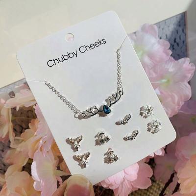 China TRENDY Silver Crystal Rhinestone Cross Heart Snowflake Flower Necklace Earrings 5 ​​Pieces Set Paper Card Jewelry for sale