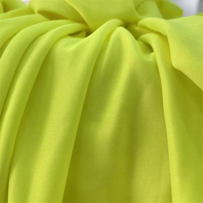 China Water Resistant Manufacturers Nylon 4 Way Stretch Self Quick Design Knit Yoga Sportswear Fabric for sale