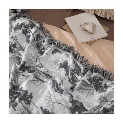 China Forest Pattern Anti-static Super Soft Nordic Sofa Air Conditioning Tassel Throw Woven Bedspread Blanket Blanket for sale