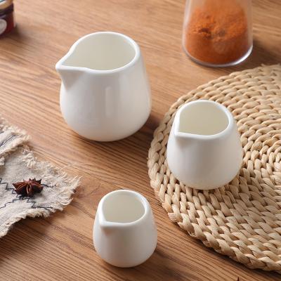 China Small Capacity Pure White Ceramic Milk Jug Viable Traditional Type Without Handle for sale