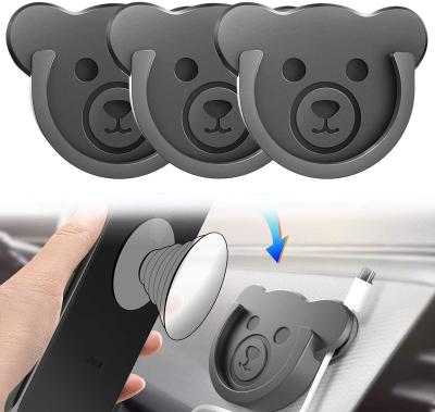 China TOPGO Flexible Socket Car Mount for Phone Holder Cute Bear Style Silicone Grip Holder with Phone Line Clasp for Folding Socket User for sale