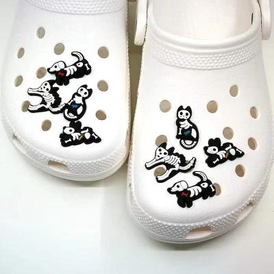 China Clog Charm 2022 Hot Selling Soft PVC The Dog Bone Shoe Decoration Cartoon Luxury Style For Croc Charms for sale