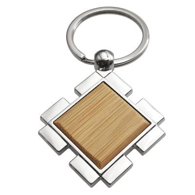 China Custom Logo Engraved Named Promotional Gift Souvenir Mute Crafts Crafts Bamboo Fingerboard Key Chains Ring Wood Keychain Wooden Crafts Gifts for sale