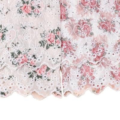 China New breathable hot sale cut out hole embroidery printed fabric for women men clothing fabric for sale