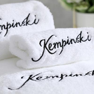 China Hypoallergenic Luxury Five Star Hotel White 100% Cotton Face Hand Bath Towels Set For Hotel Spa With Customized Logo for sale