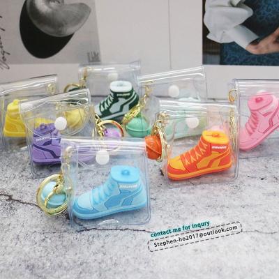 China 2021 Hand Painted Funny Soft Bag 3D Silicone Keychains Skateboard Keychains High Quality Charm With PVC Coin Purse Key Ring for sale