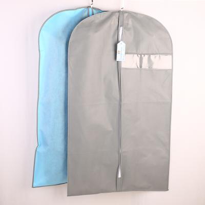 China Custom Reusable Logo Suit Eco Non Woven Travel Packaging Wedding Dress Storage Garment Bag With Zipper for sale