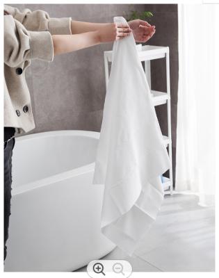 China Disposable White Super Absorbent Soft Cotton Cleaning Disposable Bath Towel For Travel for sale