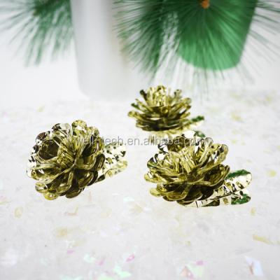 China Hand Made Christmas Tree Candle Holder 4.5cm Pinecone Shape With Pineapple Pattern Clip Metal Candle Holder for sale