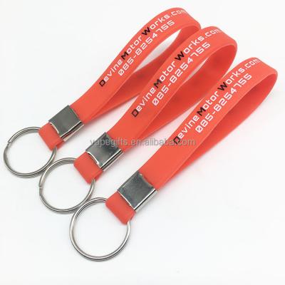 China Wholesale 2022 Cheap Printed No Logo Texts Promotional Silicone Wristband Minimum Customized Key Chain for sale