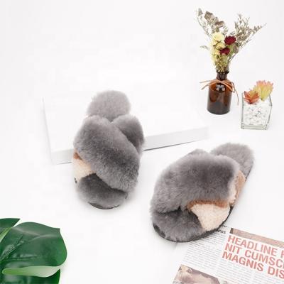 China Lightweight Female Cross Band Luxury Curly Fur Slippers Comfortable Plush Indoor Home Ladies Bedroom Fur Women's Slippers for sale