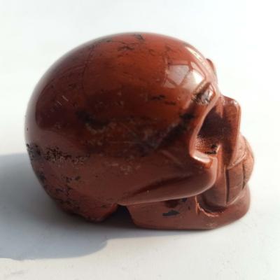 China China Wholesale Natural Crystal Jasper Carved Red Quartz Skulls Hand-carved Skulls Artwork for sale