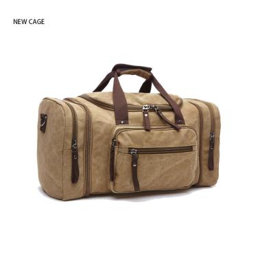 China Durable Men Women Fashion Travel Bag Outdoor Canvas Waterproof Large Capacity Weekender Travel Duffel Bag for sale