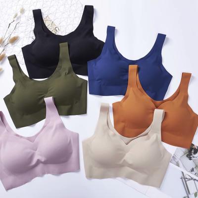 China Wireless Pump Bra With Pads Seamless Ice Silk Active Bras For Women Sleep Underwear Slim Gathered UP Sports Bra Sexy Bra for sale