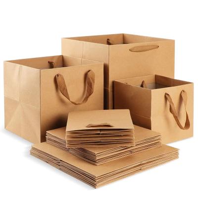 China Recycled Materials High Quality Shopping Kraft Paper Large Gift Bags Retail Brown Paper Goods Wedding Party Kraft Paper Bags for sale