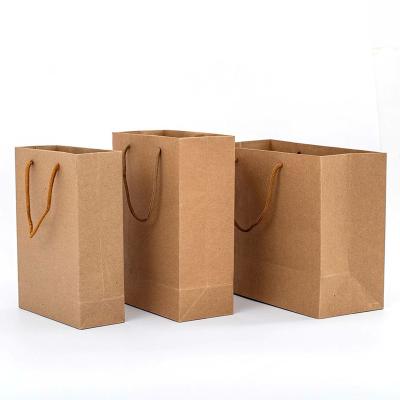 China Recycled Materials Fashionable Customizable Biodegradable Gift Shopping Tote Bag Eco-Friendly Brown Kraft Paper Bag with Handle for sale