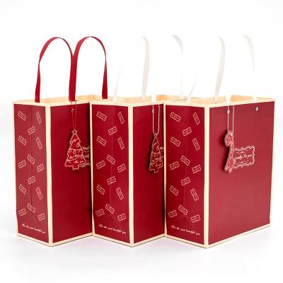 China Recycled Materials Wholesale Candy Jewelry Gift Packaging Bags Eco-Friendly Foldable Red Shopping Totes Paper Totes With Custom Logo for sale