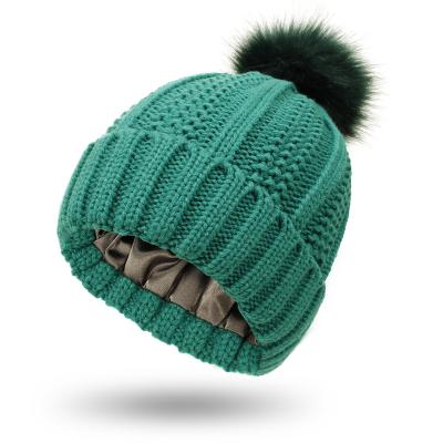 China COMMON Hot sale winter caps for men knitted hats are loose and warm autumn and winter Stripe beanie cap for sale