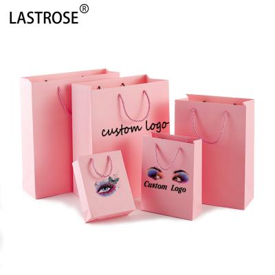 China Thick Lash Packaging Paper Bag Wholesale Eyelash Bag With Handles Customized Logo Handbag Mini Gift Packaging Plastic Bags For Lashes for sale