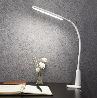 China Modern Minimalist Stereoscopic Placement Eye Protection Desk Lamp USB Eye Shield Lamp Folding Plug-in Contact Dimming LED Desk Lamp for sale