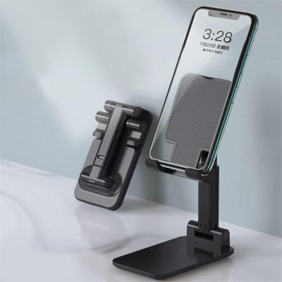 China Foldable and Portable Height Adjustable Foldable ABS Mini Tabletop Tablet Plastic Desktop Stand for Cell Phone Mobile Holder for sale