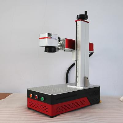 China Fiber Laser Marking Machine Desktop MAX Raycus JPT 20W 30W 50W Met draaiende as Te koop