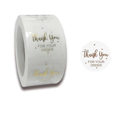 China Custom Logo Label Shipping Sticker Strong Adhesive Waterproof Paper Roll Waterproof for sale