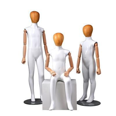 China Full body children window environmental protection head and hand sitting position child wooden mannequins clothing model Upper high-end disply body for sale