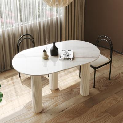 China Anti-collision modern luxury simple arc adjustable corner furniture (height) marble dining table set for sale