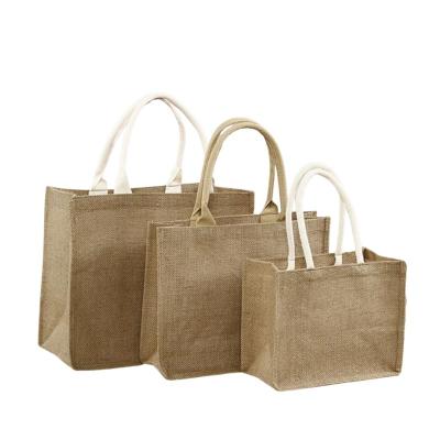 China Hot Selling Empty Brown Jute Gift Handled Bags, Reusable Burlap Shopping Bags With Customized Logo for sale