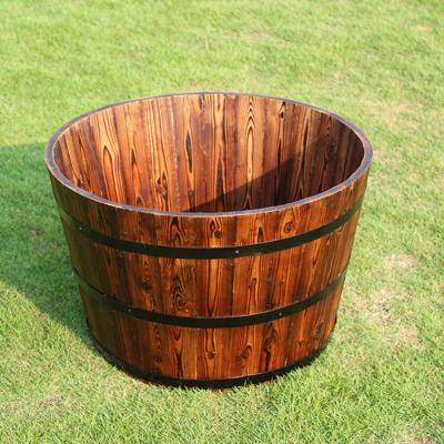 China Modern Wooden Barrel Indoor Outdoor Wood Planter With Drainage Holes Wood Planter Wood Bucket for sale