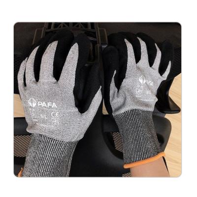 China Sandy Nitrile Palm Coated-ANSI Niveau 5 Gesneden Bestand Handschoenen voor het Herstellen en Pakhuis Te koop