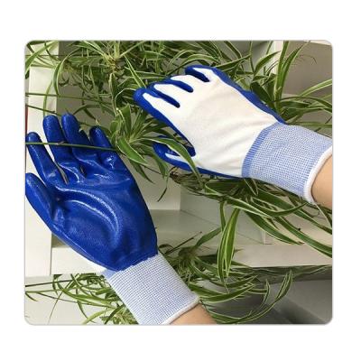 China Electromobile And Bicycle Maintenance White Polyester Knit Blue Nitrile Gloves for sale