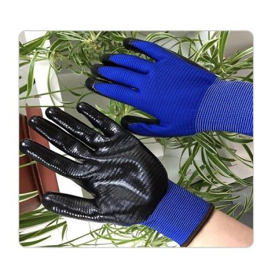 China Guantes azules inconsútiles del trabajo de la salvaguardia de la capa del nitrilo del negro del punto del poliéster en venta