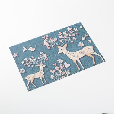 China Hot Sale Christmas Oilproof Deer Dining Table Mats Luxury Coffee Cup Non-Slip Pad PVC Woven Place Mats for sale