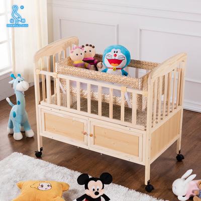 China Durable Multifunctional Baby Crib Wooden Baby Bed with Mosquito Net and Drawers en venta