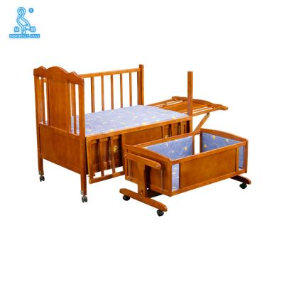 China Portable Multifunctional Wooden Demountable Luxury Baby Furniture 2 In 1 Crib Crib en venta