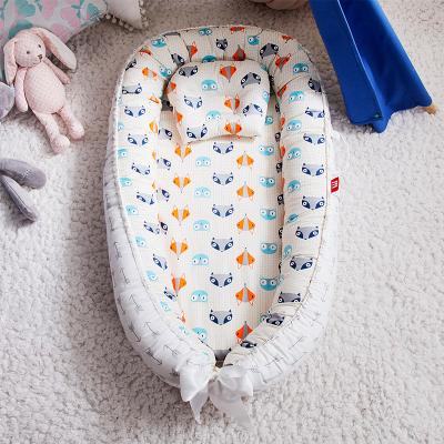 China Modern baby sleep nest travel bed with pillow, suitable for online sale en venta