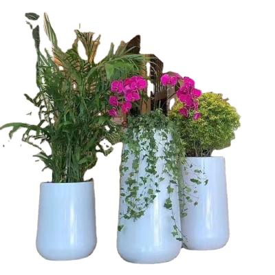 China Leizisure Modern New Design Cannon Like Indoor and Outdoor Cylinder Tall Planter Huge Decoration Flowerpot for sale