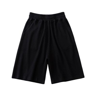 China Anti-wrinkle men's loose five-point shorts custom made waffle loose sports and comfortable summer high quality men's shorts for sale