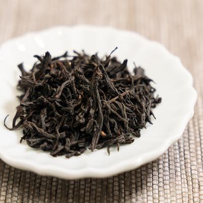 China Wholesale loose Lapsang smoky souchong flavor premium tea Fujian Wuyi Chinese factory black tea for sale