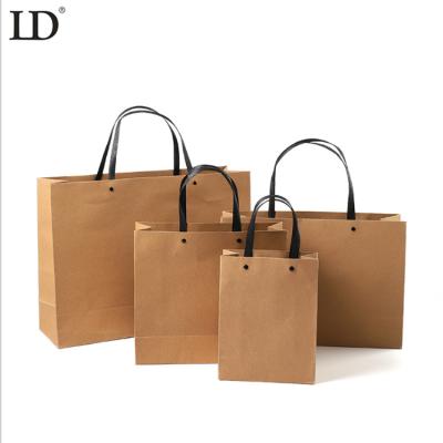 China Wholesale Good Quality / Custom Brown Kraft Gift Craft Shopping Stock White Paper Bag With Handles for sale