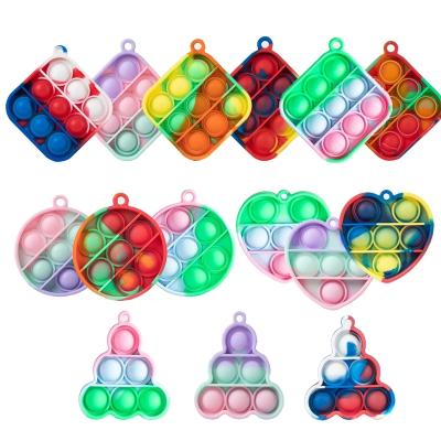 China Good Healthy Simple Relaxing Dimple Portable Keychain Small Fidget Toys For Kids Adults for sale