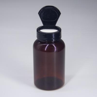 China 100ml Amber Personal Skin Care Capsule Packaging Pet Bottles Flip Top Cap Vitamin Packaging Plastic Pharmaceutical Bottle for sale