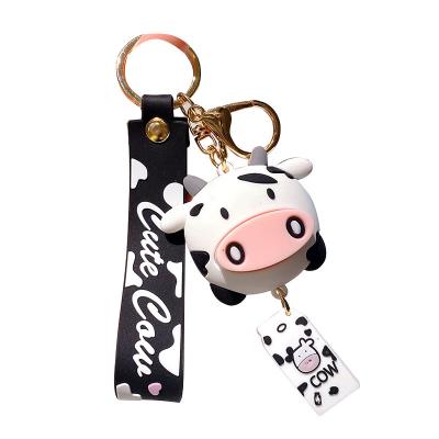 China 2021New Arrival Small Cow Key Chain DIY Black and White Cow Animal Silicone Key Chain Trend for Car and Bag Decorations for sale