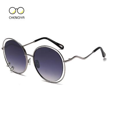 China Fashion sunglasses 2021 new hollow metal fashionable wave leg sunglasses female personality sunglasses shape sunglasses for sale