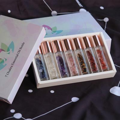 China Personal Care Chakra Perfume Bottle 10ml Natural Stone Infused Essential Oil Chakra Quartz Roller Bottle Set for sale